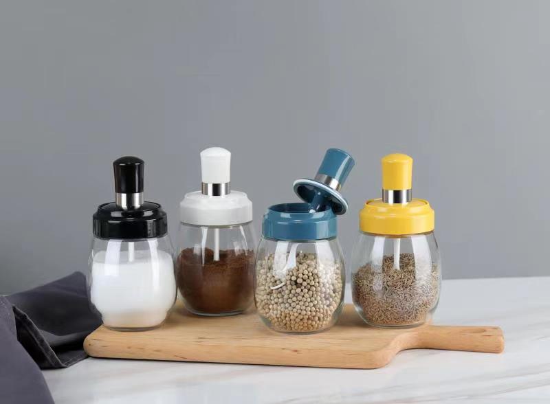 Glass spice jar with spoon
