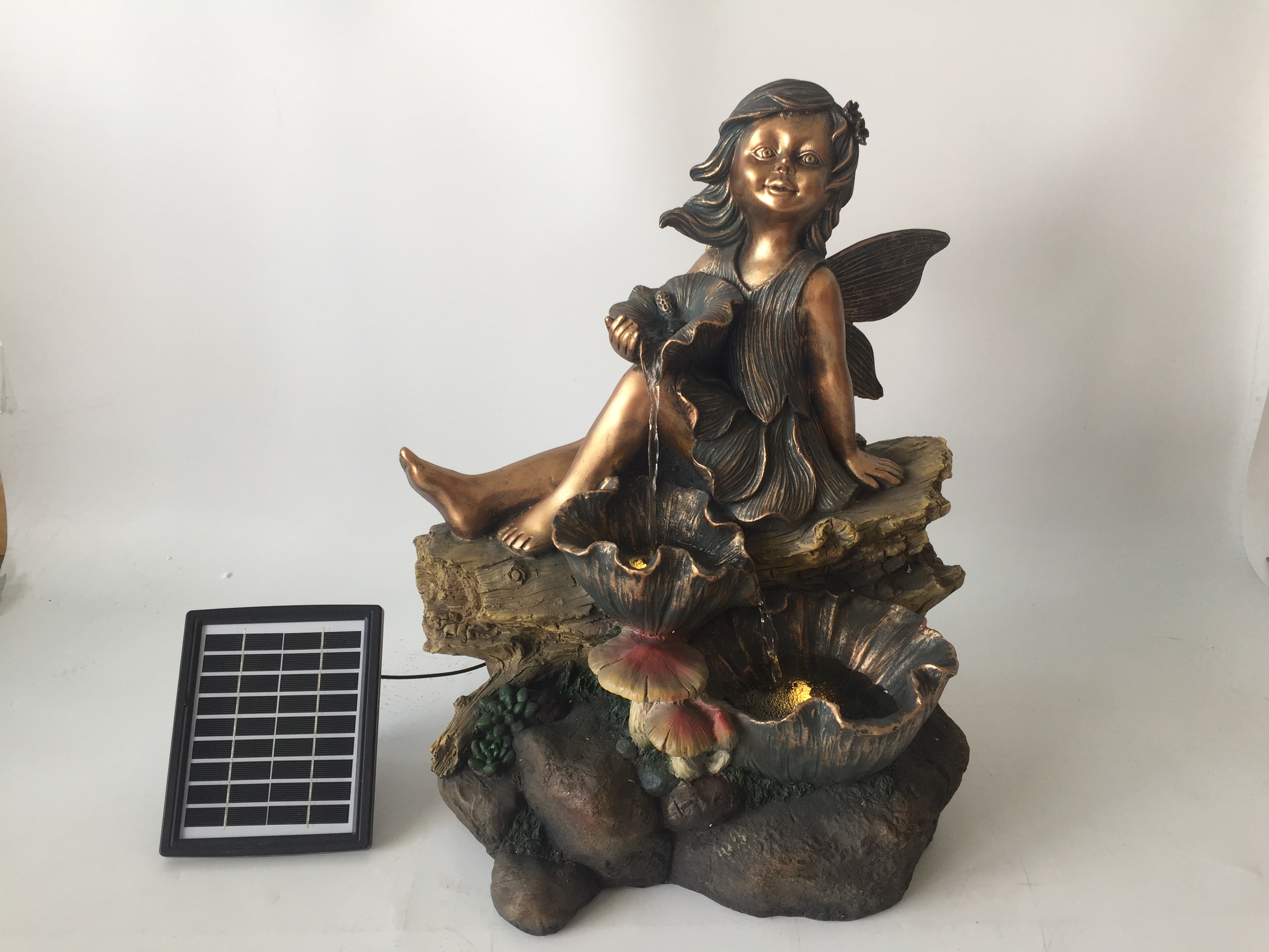 solar water fountain with the bronze statue