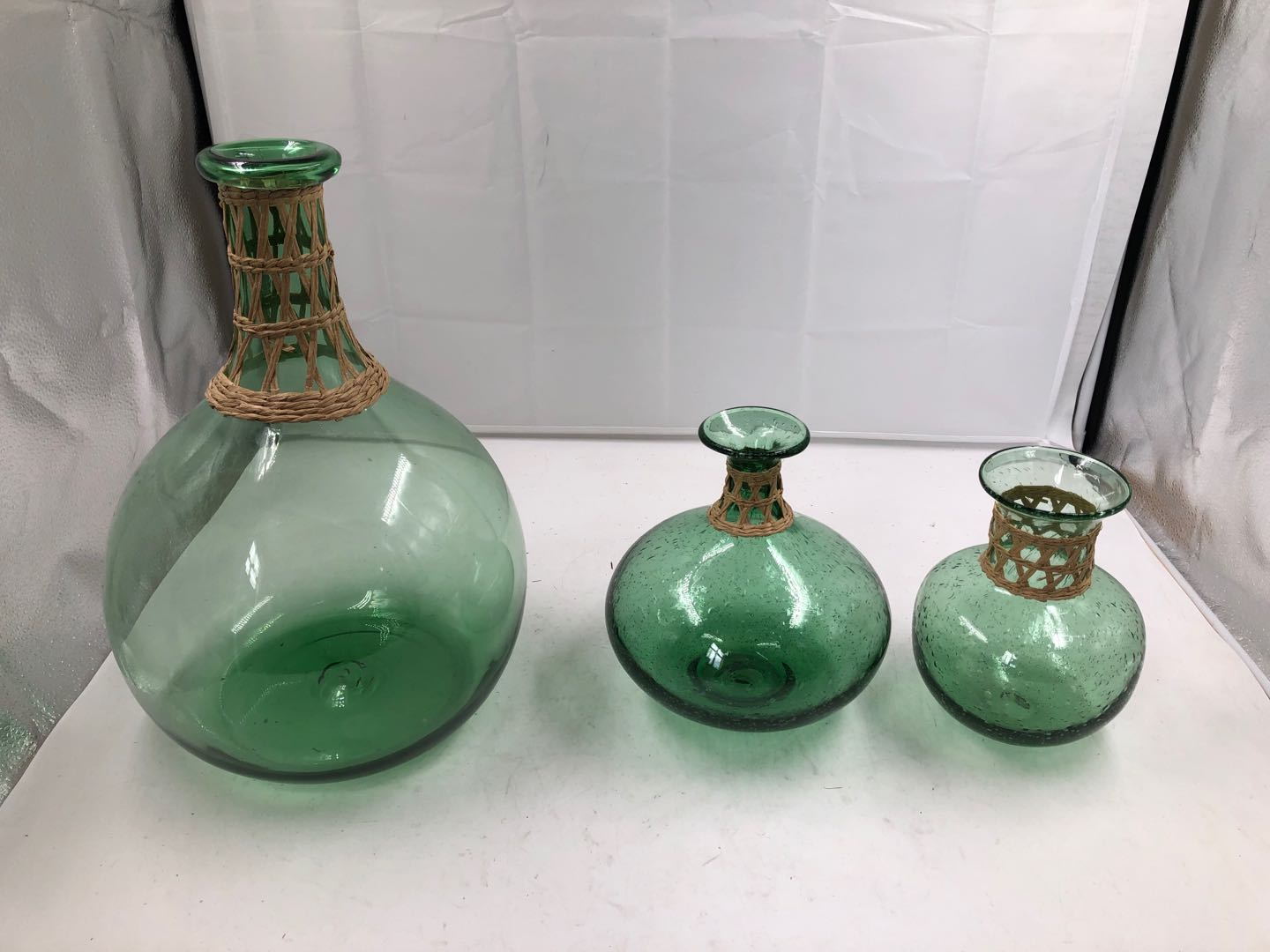 Environmentally friendly green glass vase with woven mouth