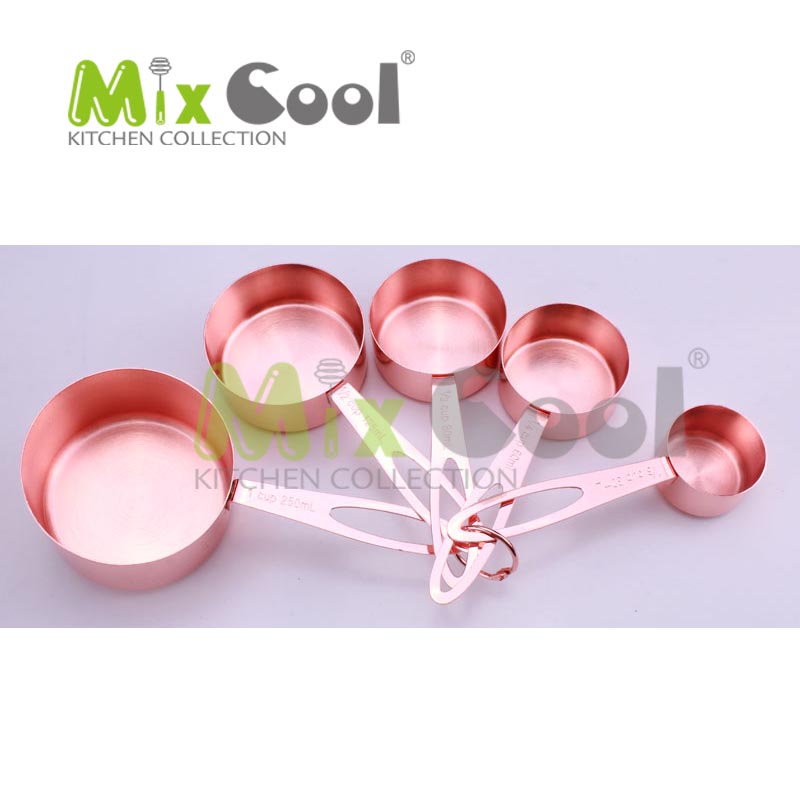 Golden measuring spoon