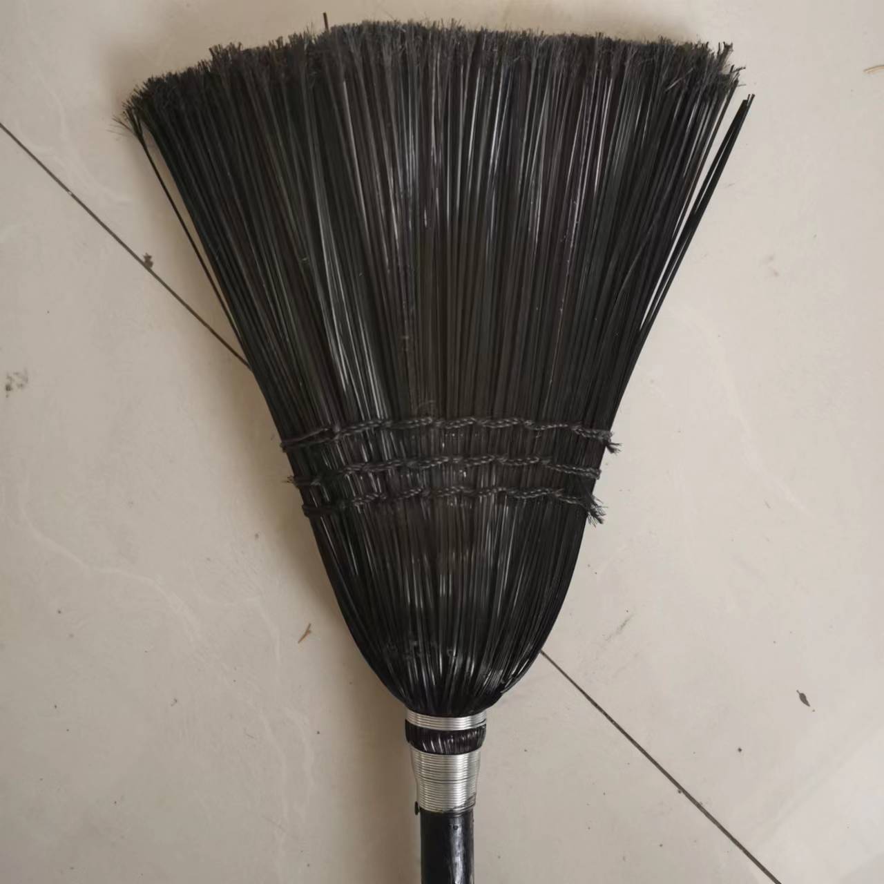 black plastic broom
