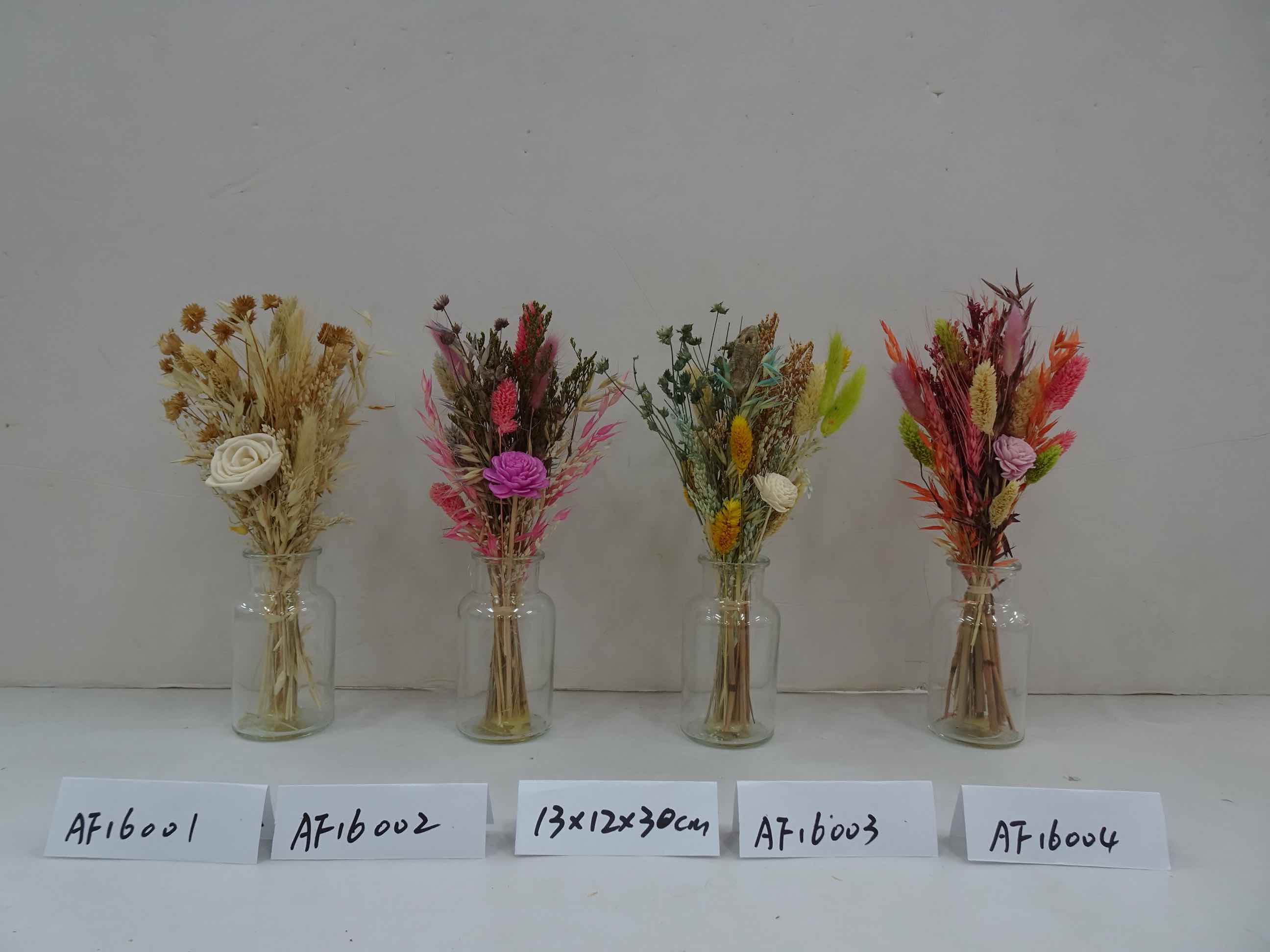 Dried Flowers Arrangement In Glass Vase