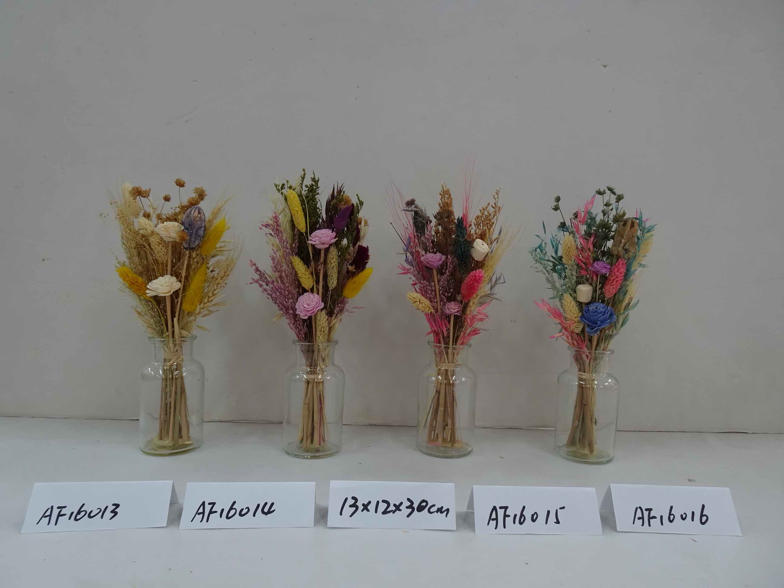 Dried Flowers Arrangement In Glass Vase