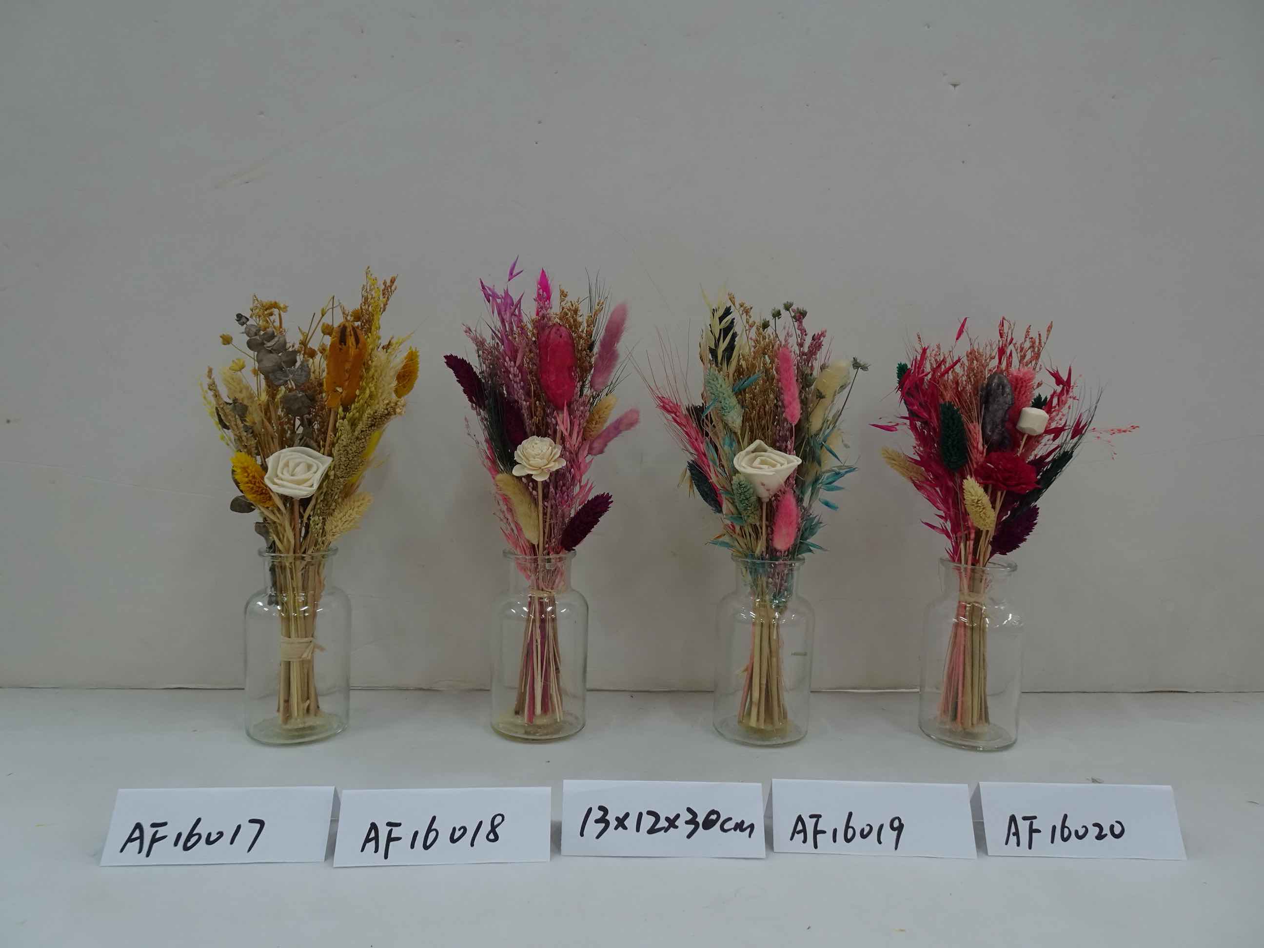 Dried Flowers Arrangement In Glass Vase