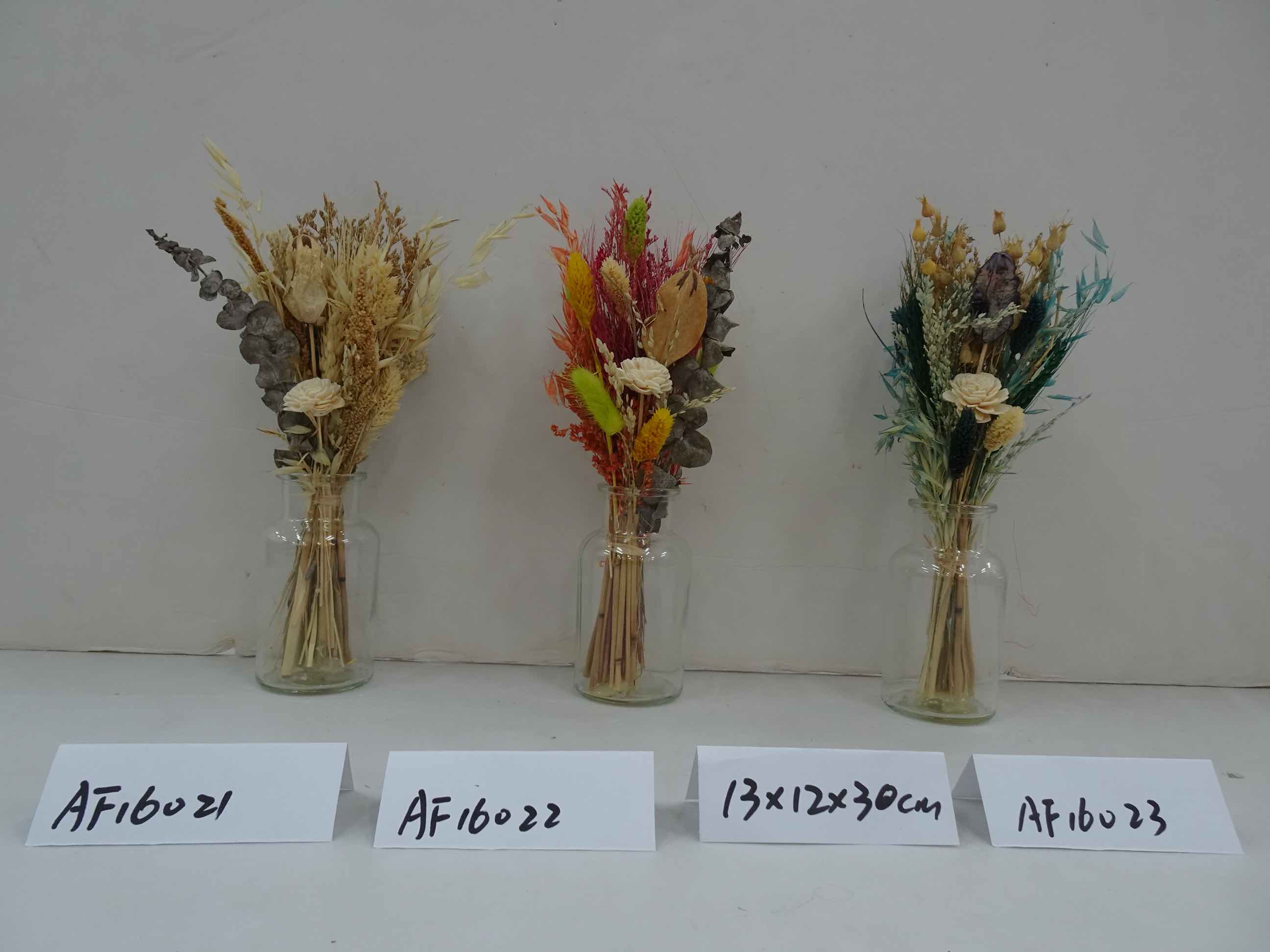 Dried Flowers Arrangement In Glass Vase