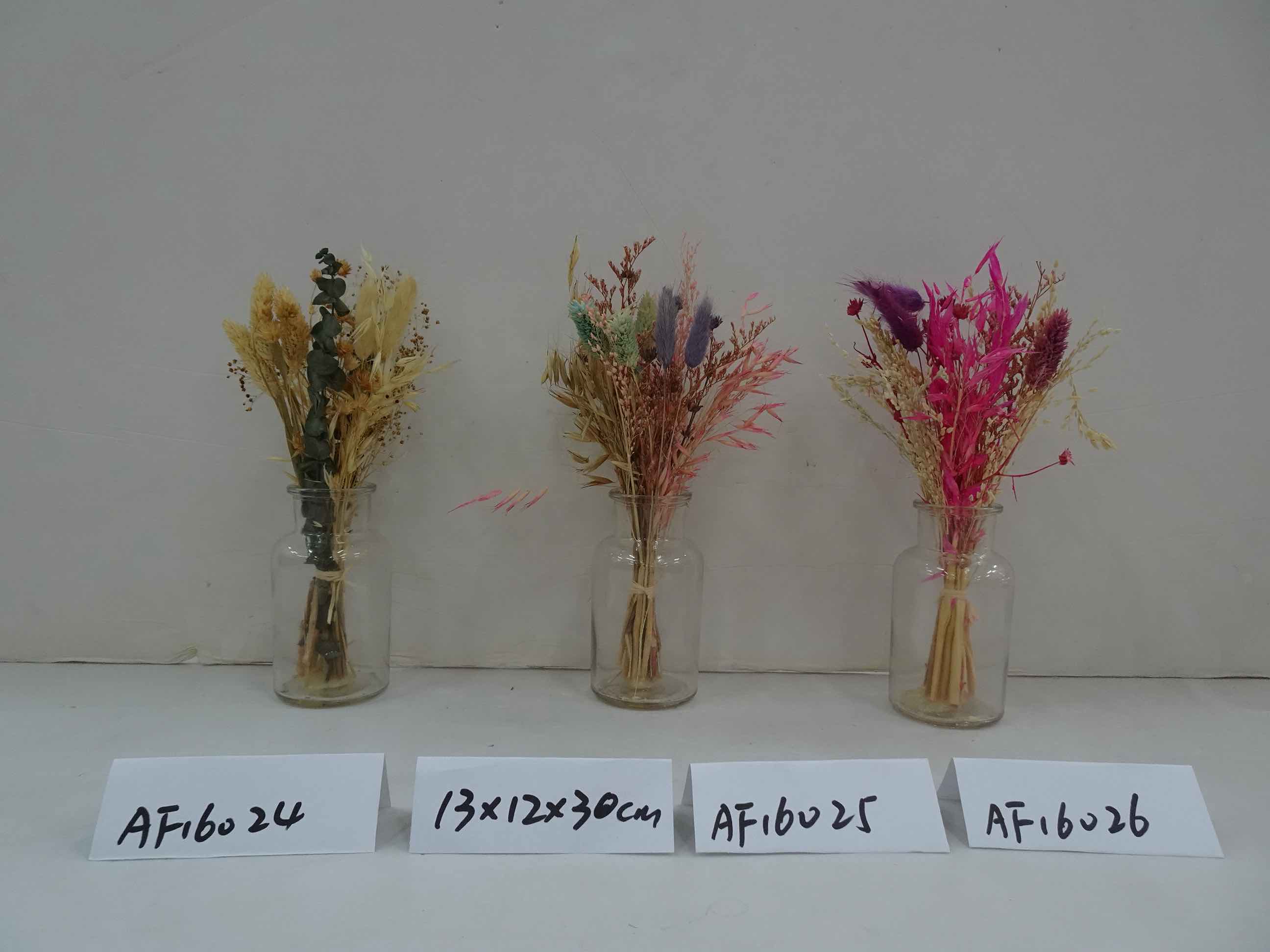Dried Flowers Arrangement In Glass Vase