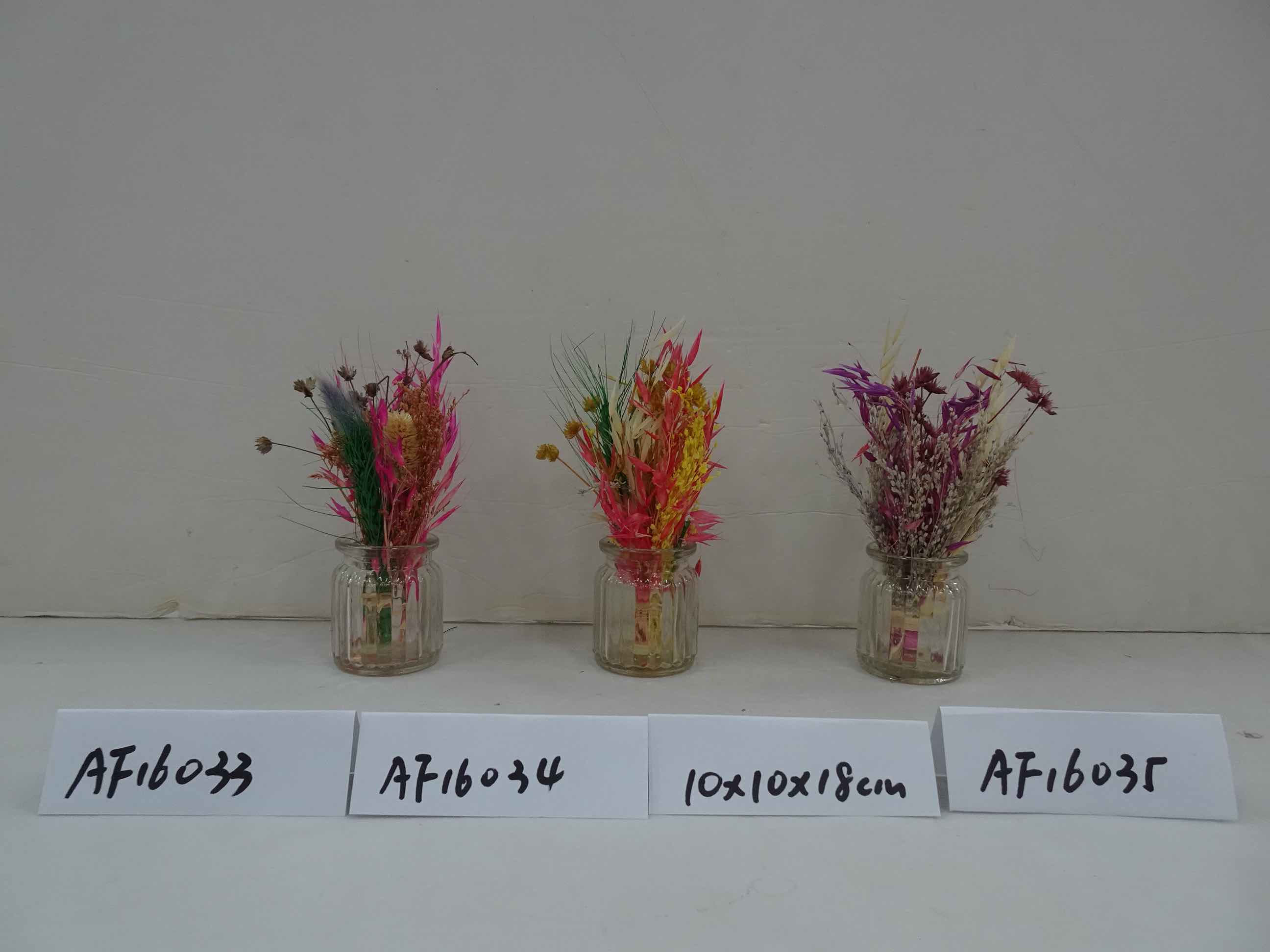 Dried Flowers Arrangement In Glass Vase