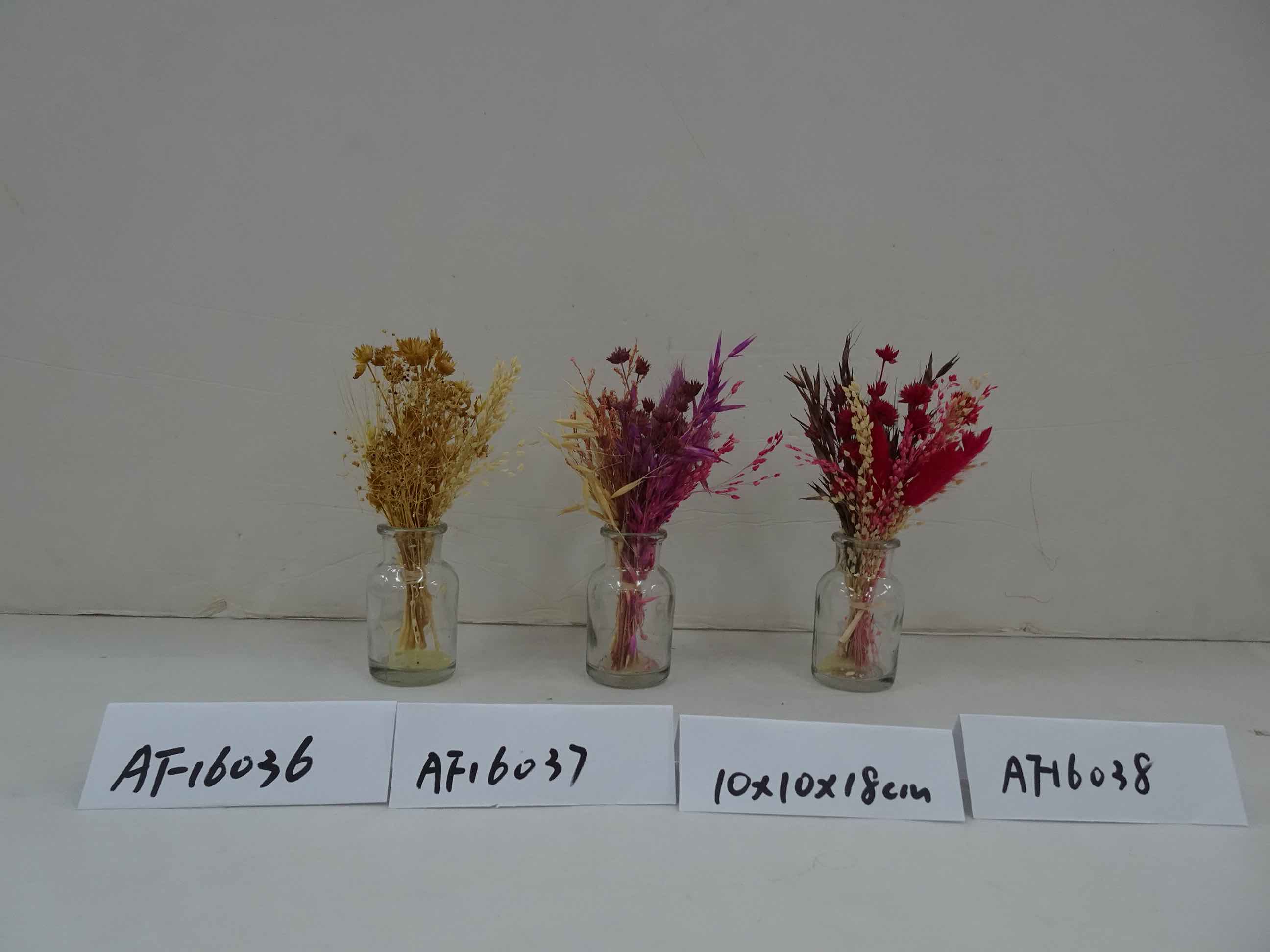 Dried Flowers Arrangement In Glass Vase