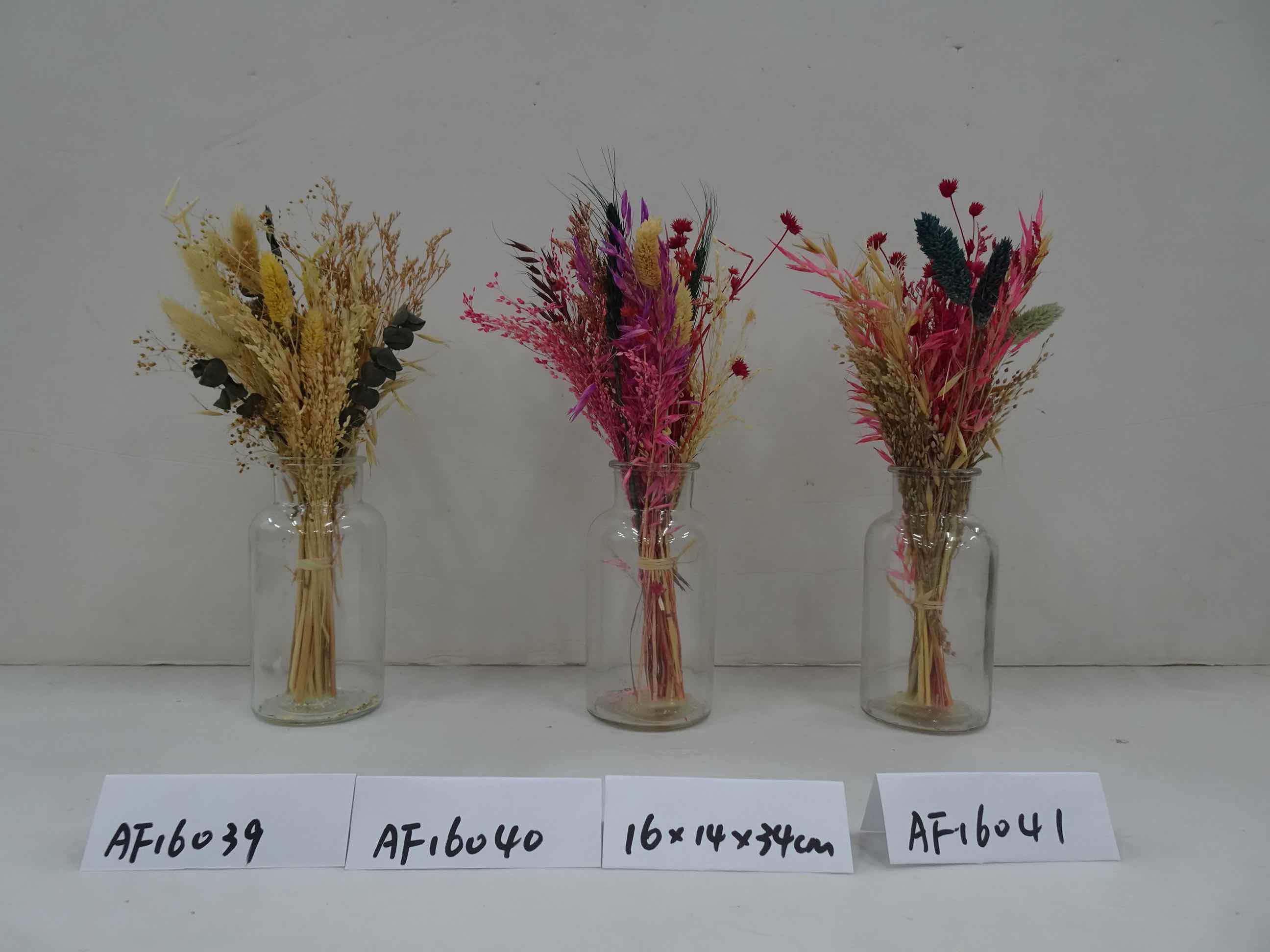 Dried Flowers Arrangement In Glass Vase