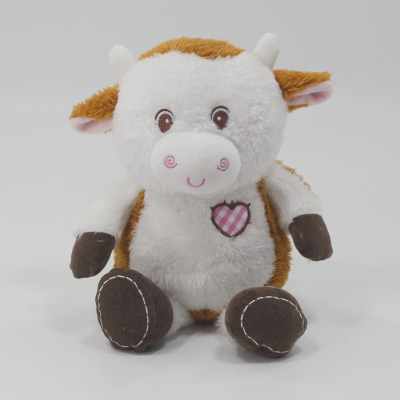 Stuffed plush cow with heart