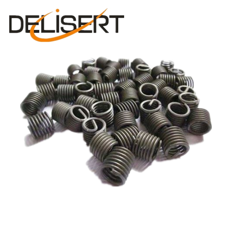 Dry film lubricated steel wire insert
