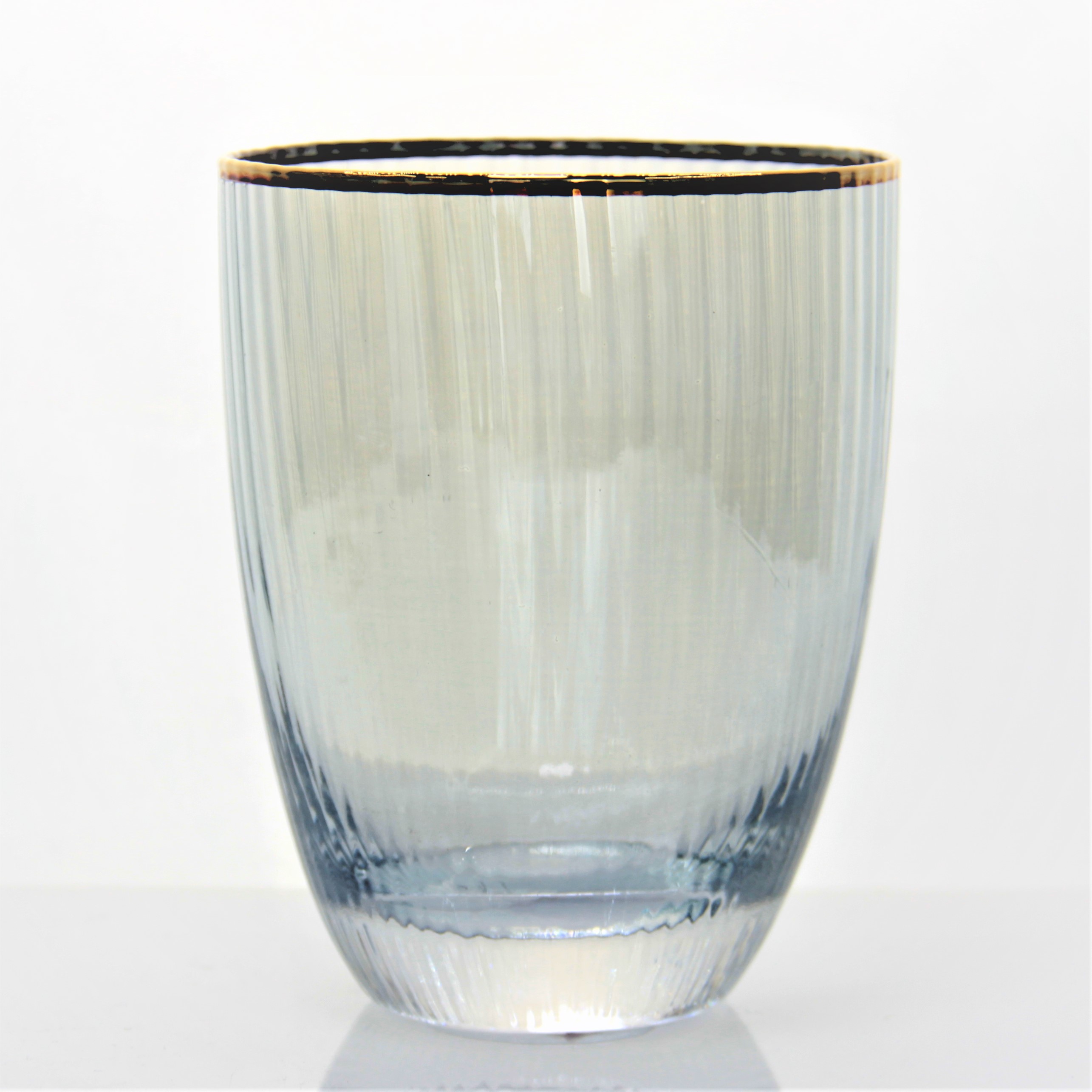 ribbed clear wine glass with gold rim