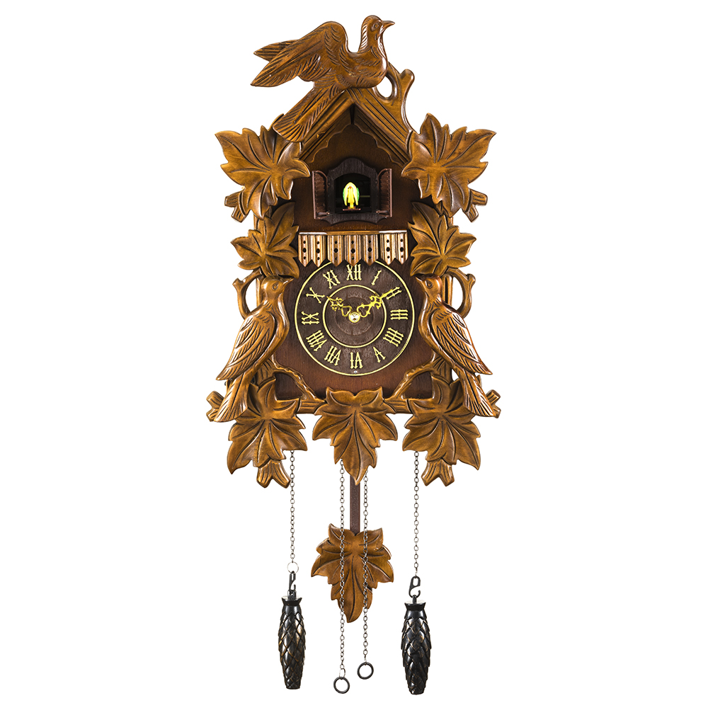 Traditional leaf and bird cuckoo clock