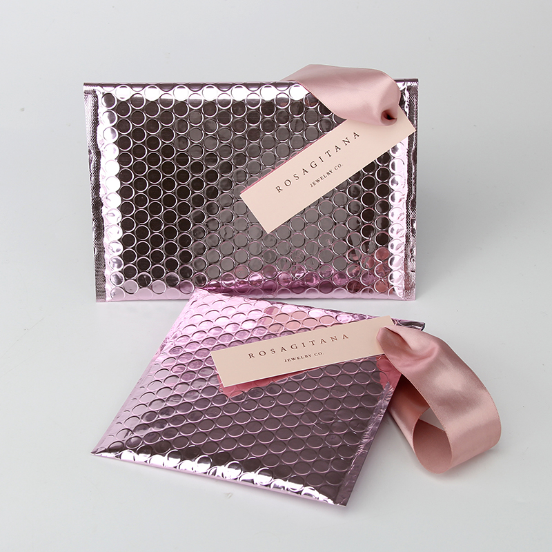 pink bubble mailer bag rose gold color with ribbon jewelry packaging bubble bag