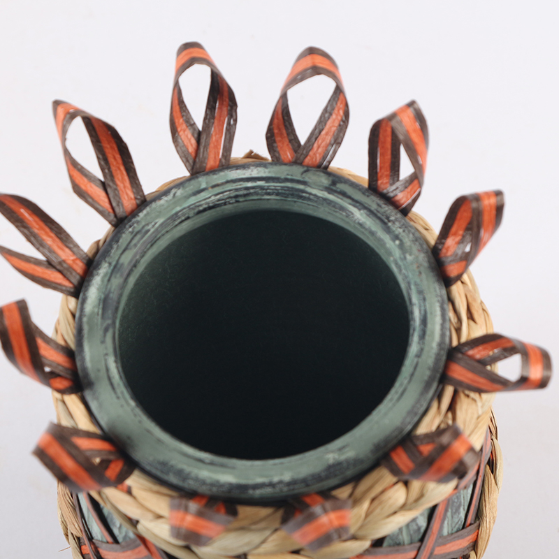 Ceramic vase with paper rope woven bottle cover