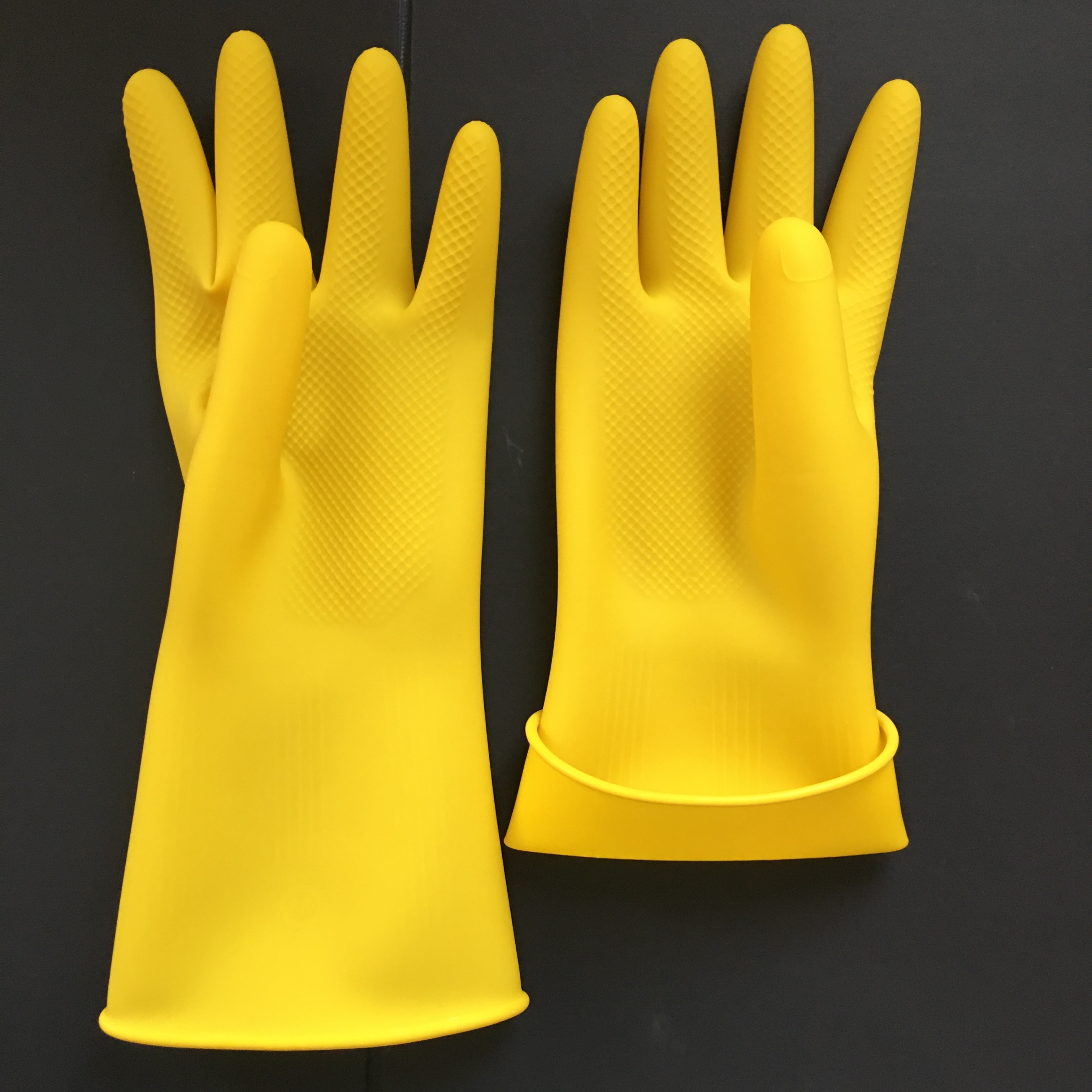 Xingli wholesale top quality yellow color durable household latex gloves