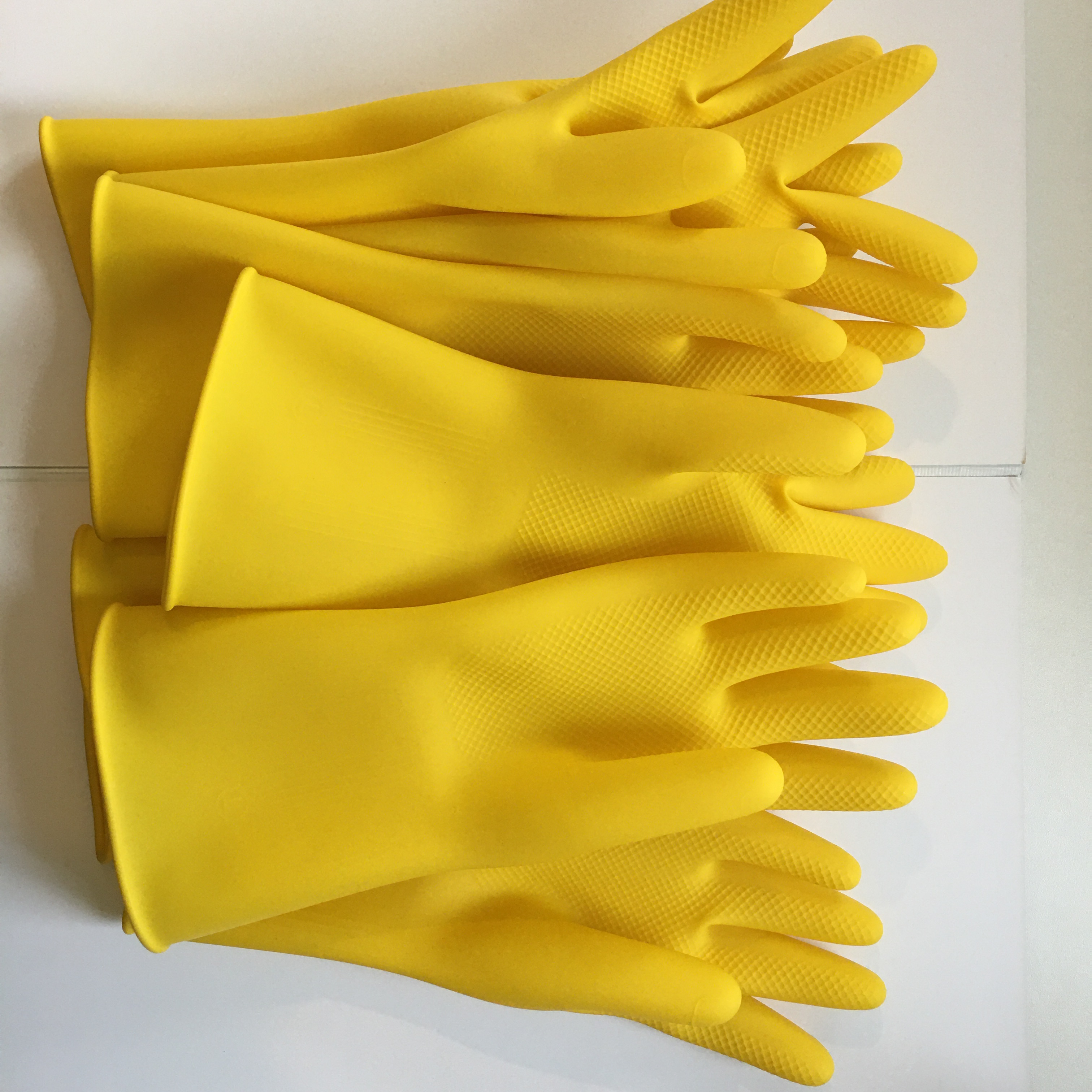 Xingli wholesale top quality yellow color household latex gloves