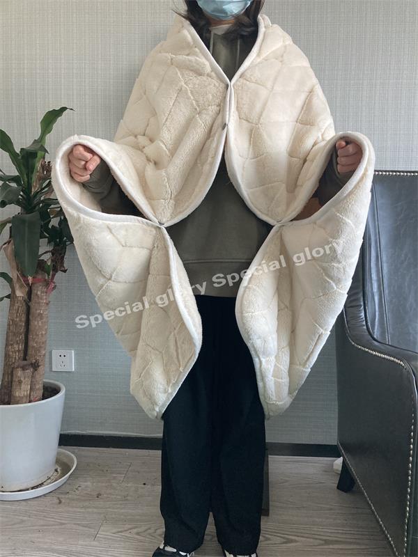 Poncho in rabbit fur