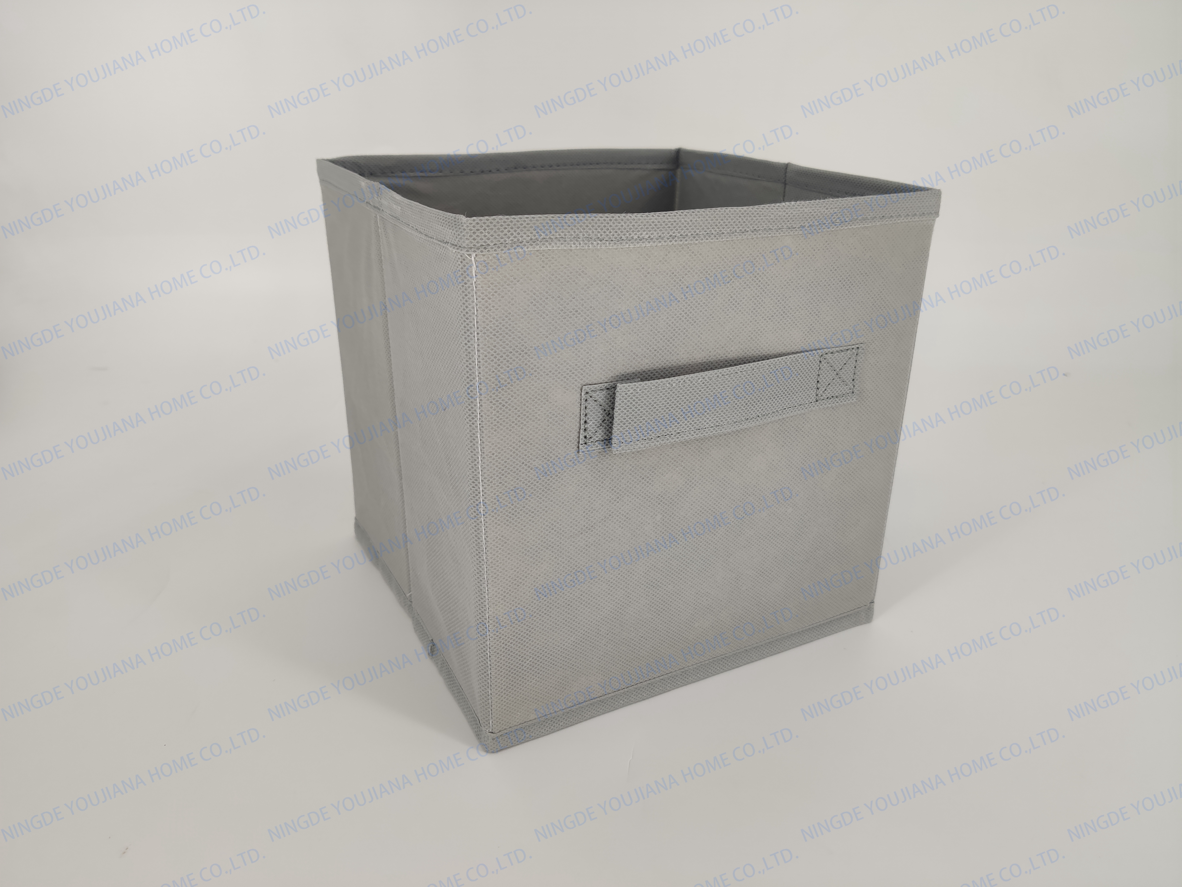 Storage box with fabric handle