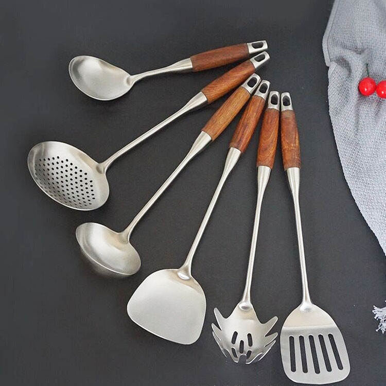 Stainless steel kitchen ware with wooden handle