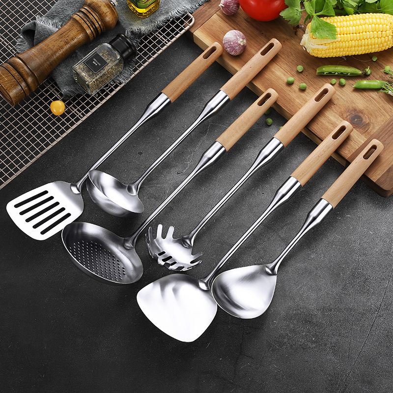 Stainless steel kitchen ware with wooden handle