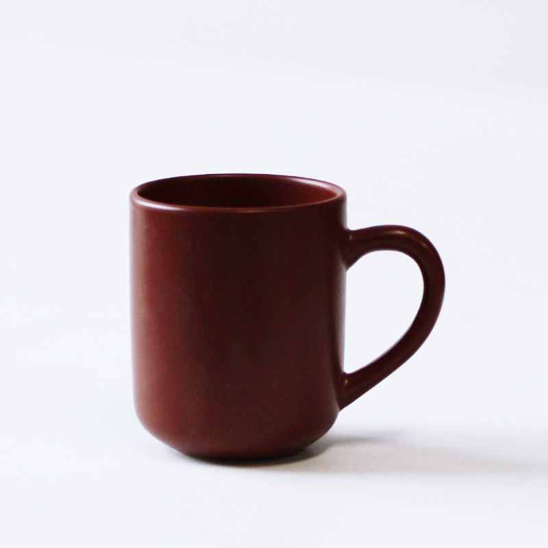 Ceramic coffee mug with red color