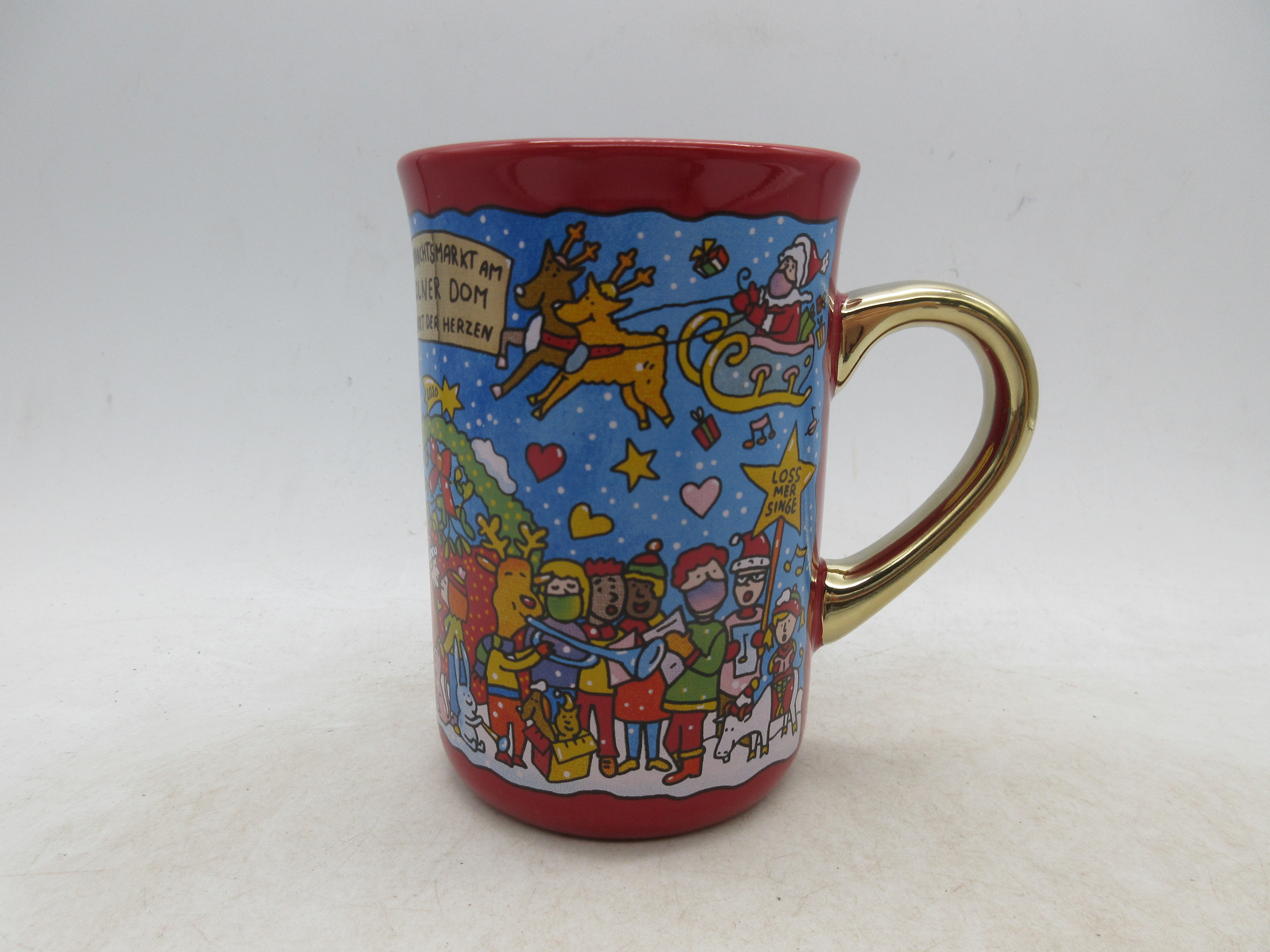 Ceramic mug with gloden handle