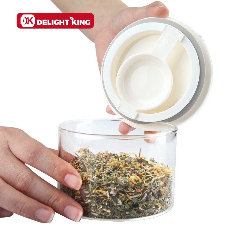 Round glass kitchen food storage jar with plastic lid and spoon stackable glass storage canister
