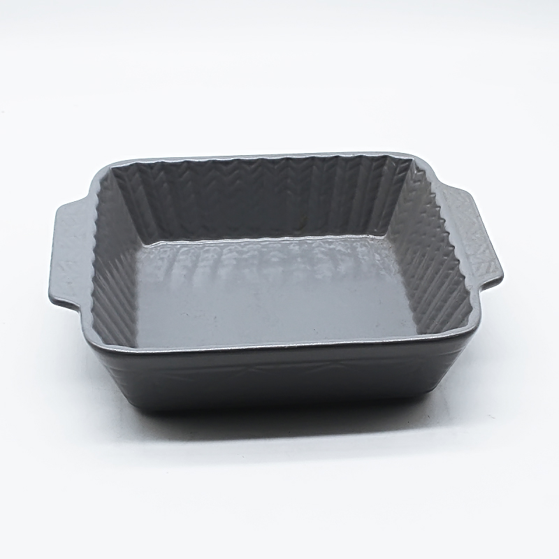 Solid color ceramic baking tray with embossed design