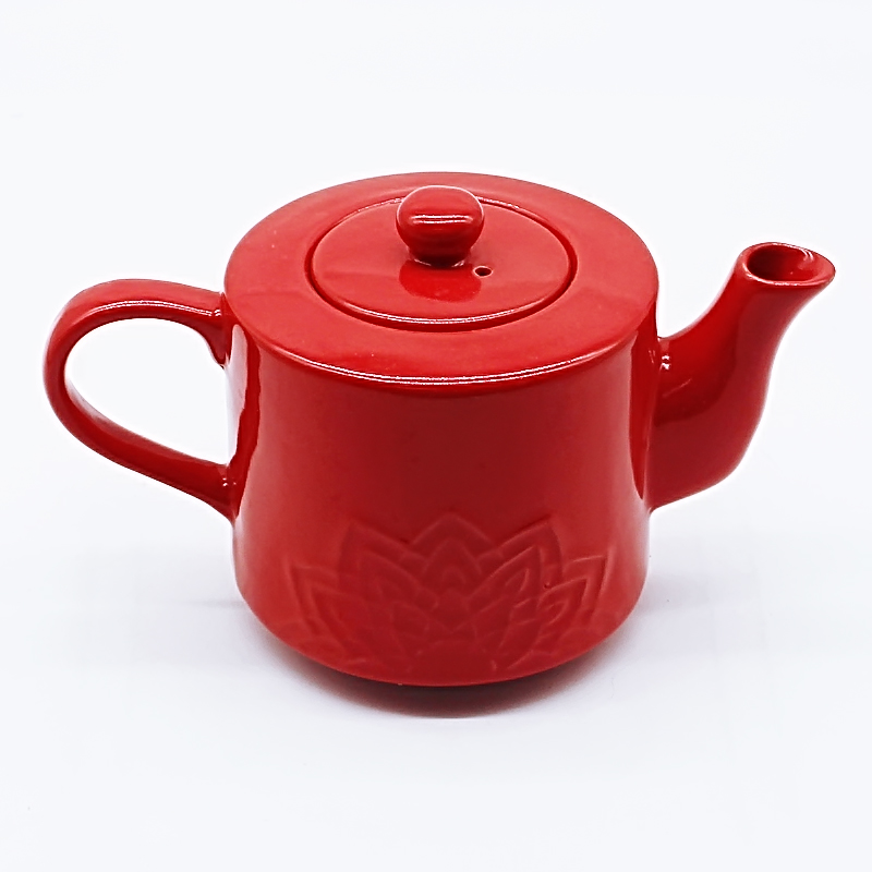 Ceramic tea pot with red color