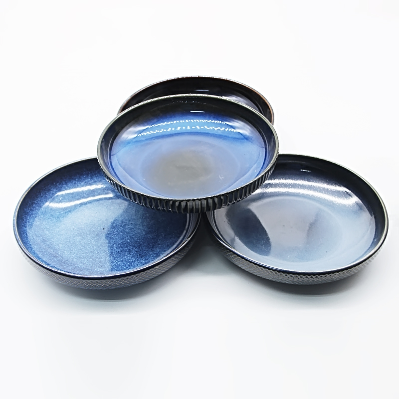 Ceramic dinner plate with reaction glaze