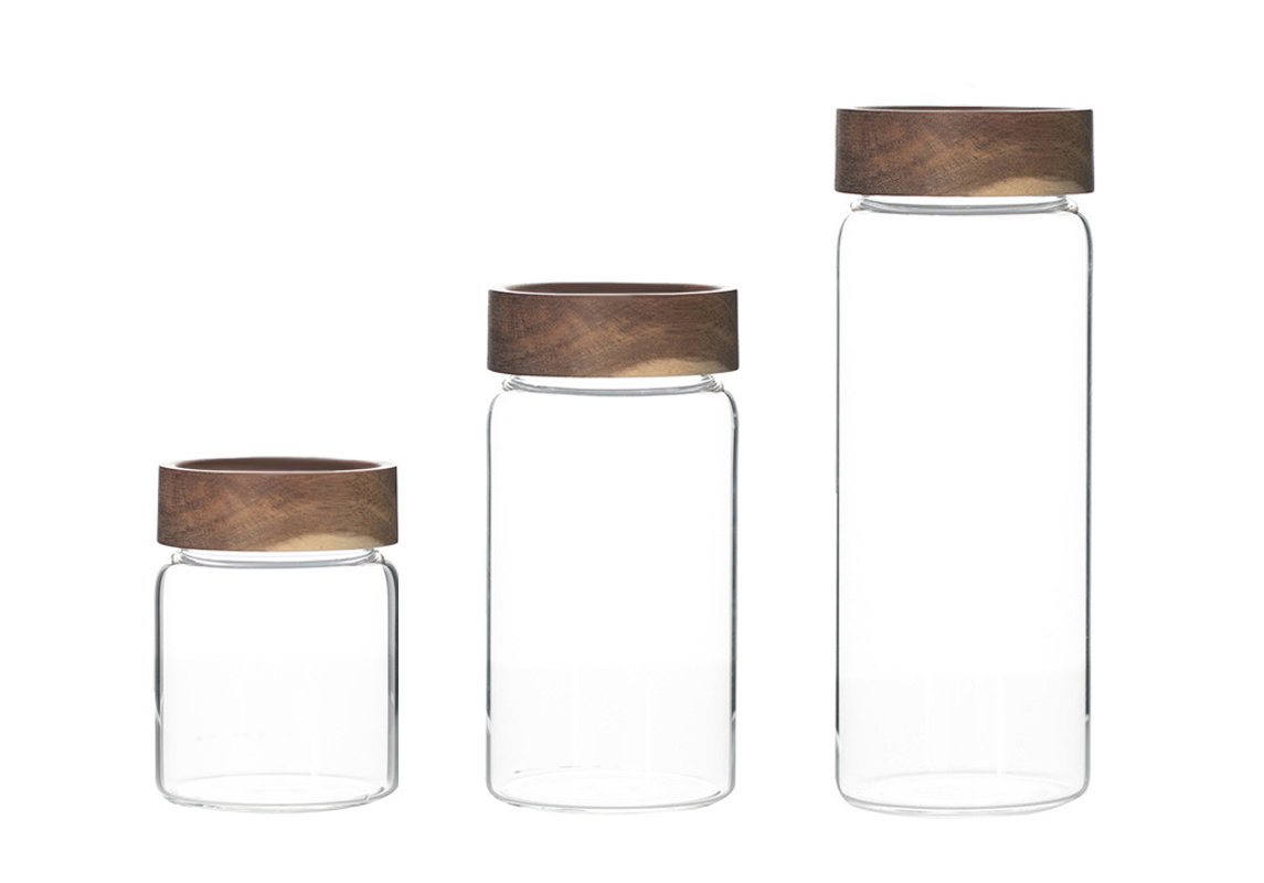 Screw top glass container with acacia lid