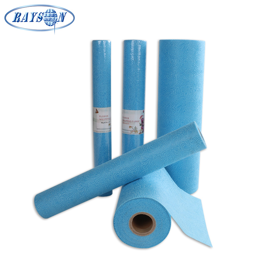 Spunbond non woven with embossed design for packaging material