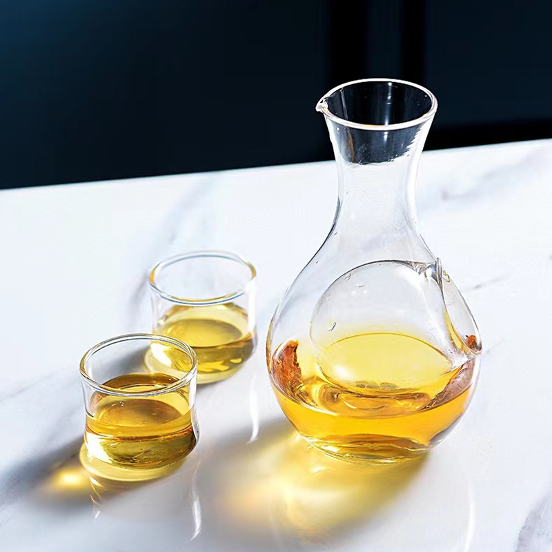 Glass wine bottle with transparent holes