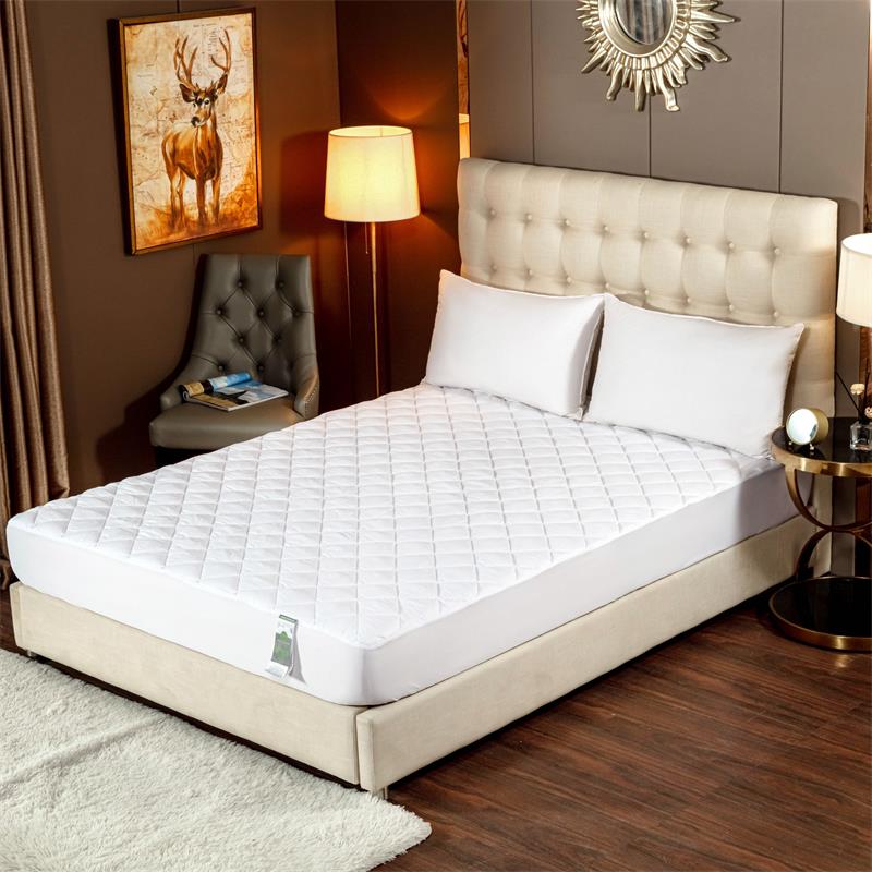 Cool touch luxury quilted mattress pad with embossed top