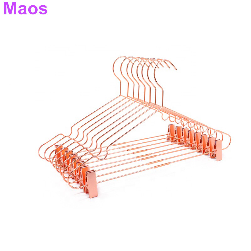 Metal clips hanger with red copper finishing