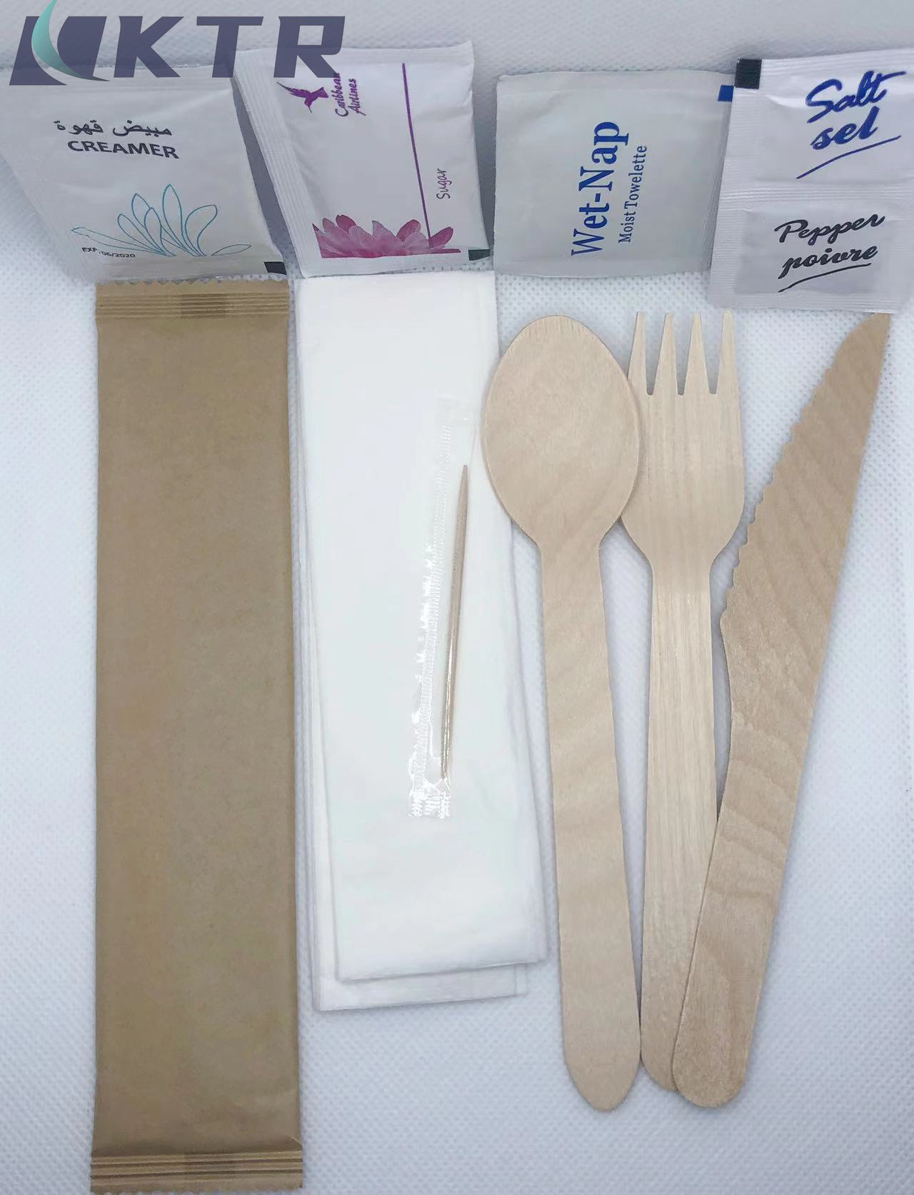 Knife+fork+spoon+napkin+toothpick in a paper bag