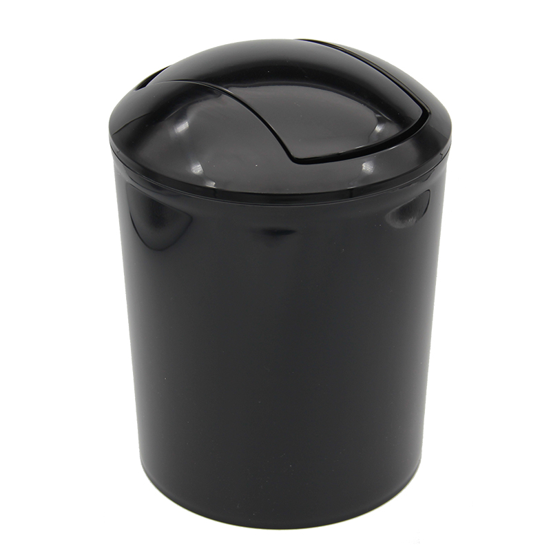 Waste bin with swing cover