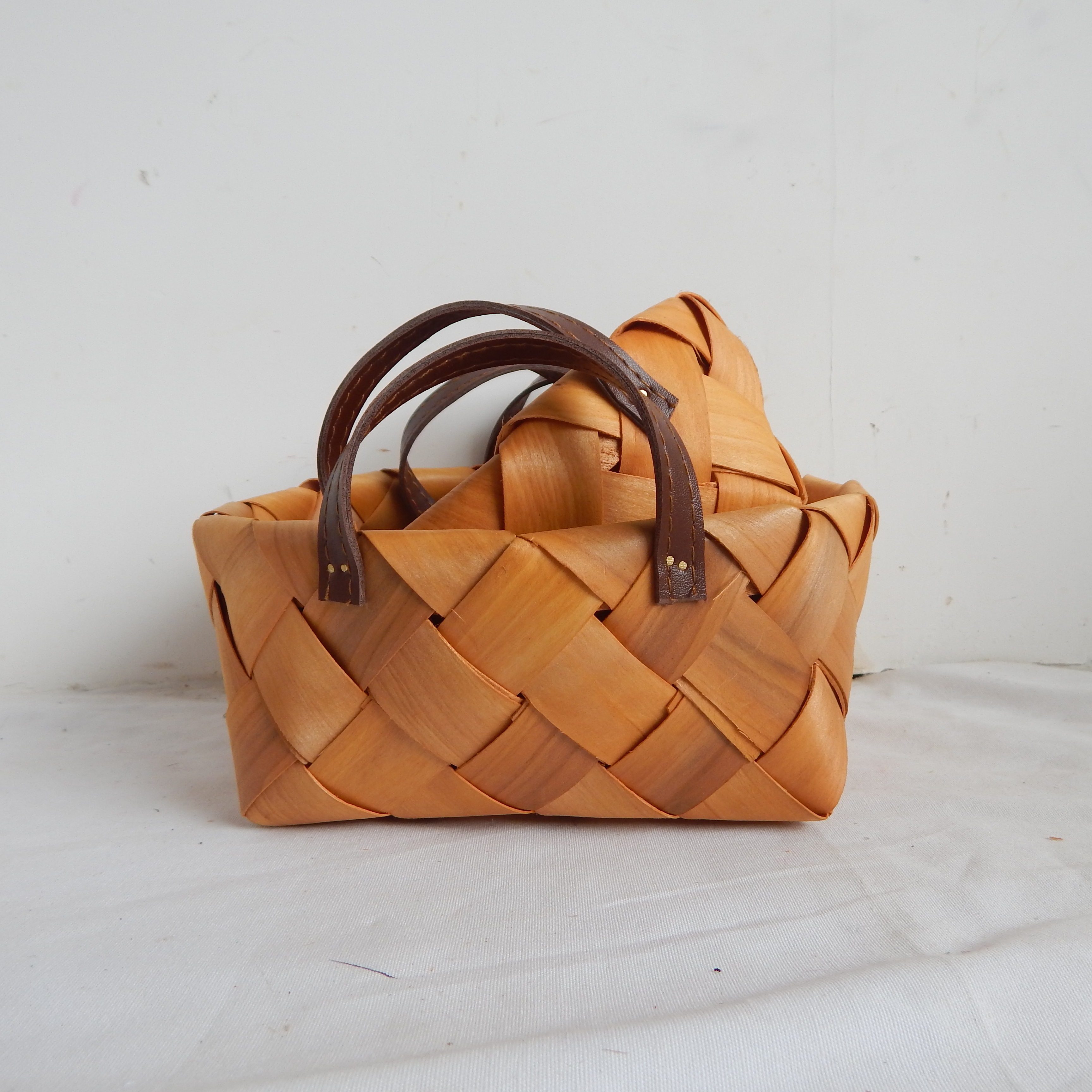 Woodchip storage basket