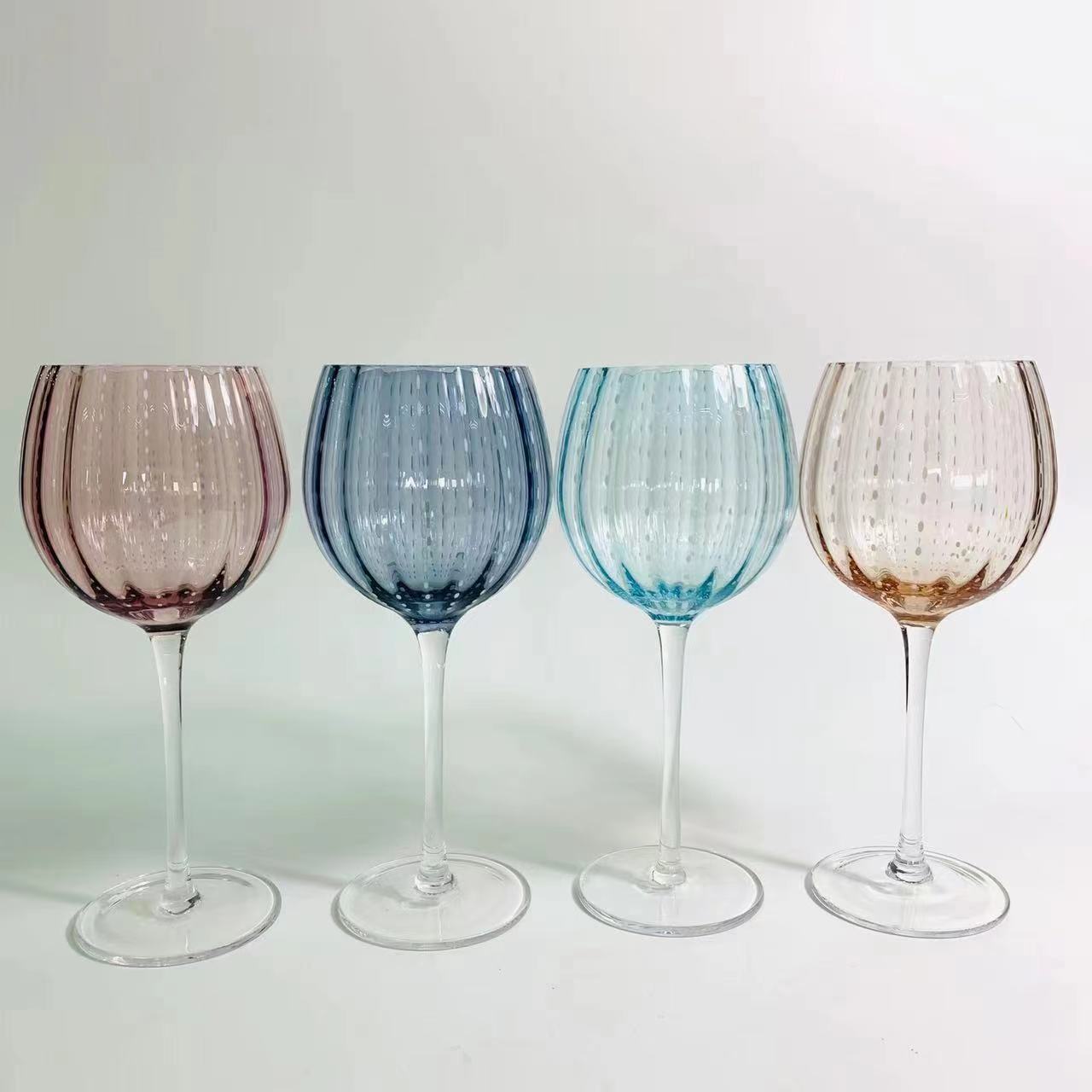 Solid color wine glass with white dot