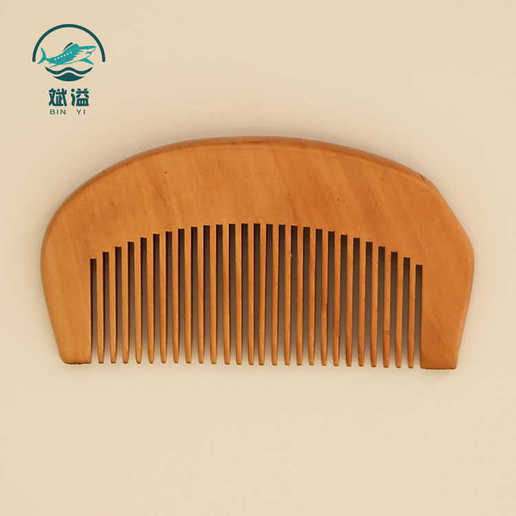 Wooden hair comb
