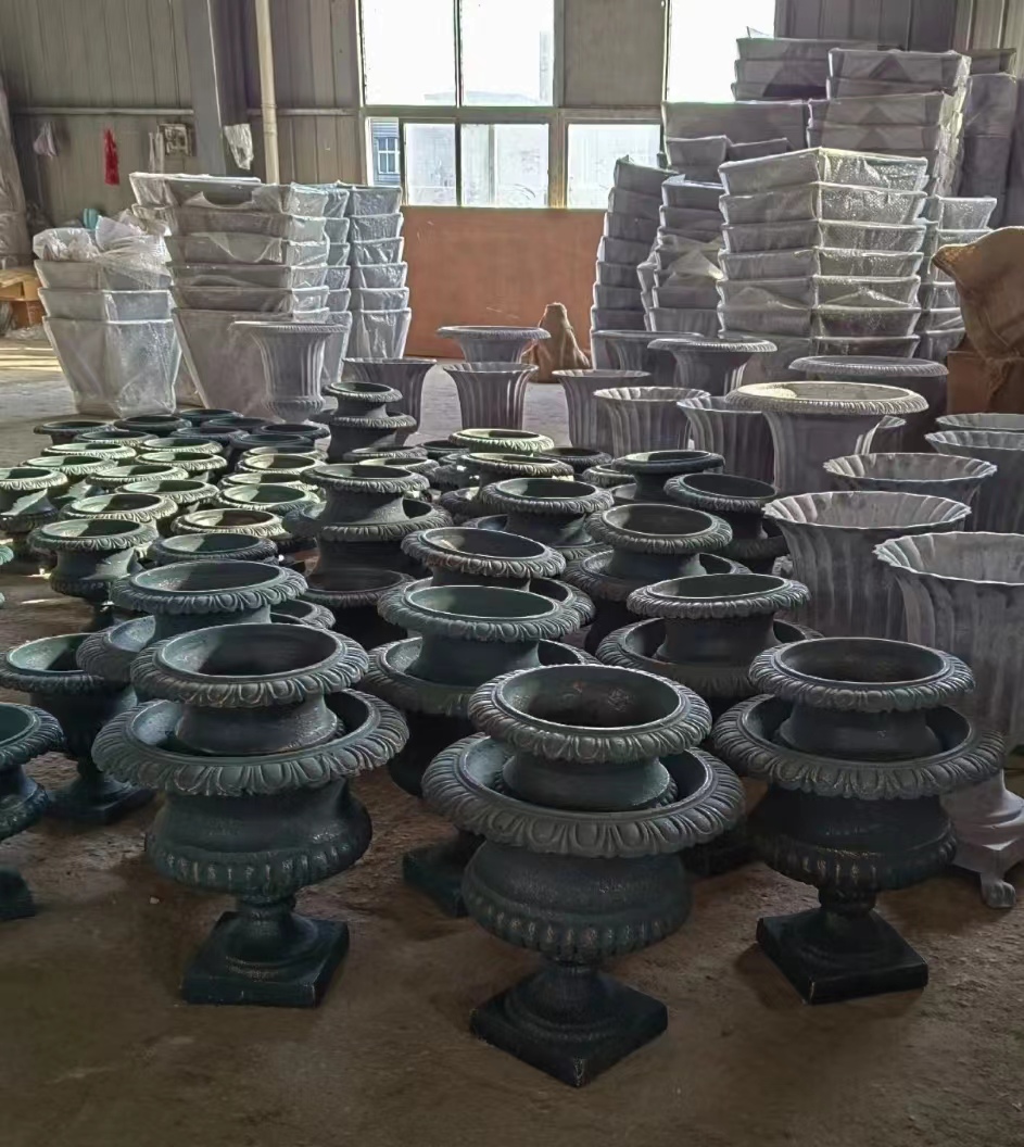 Cast iron urn and planter and other ornaments
