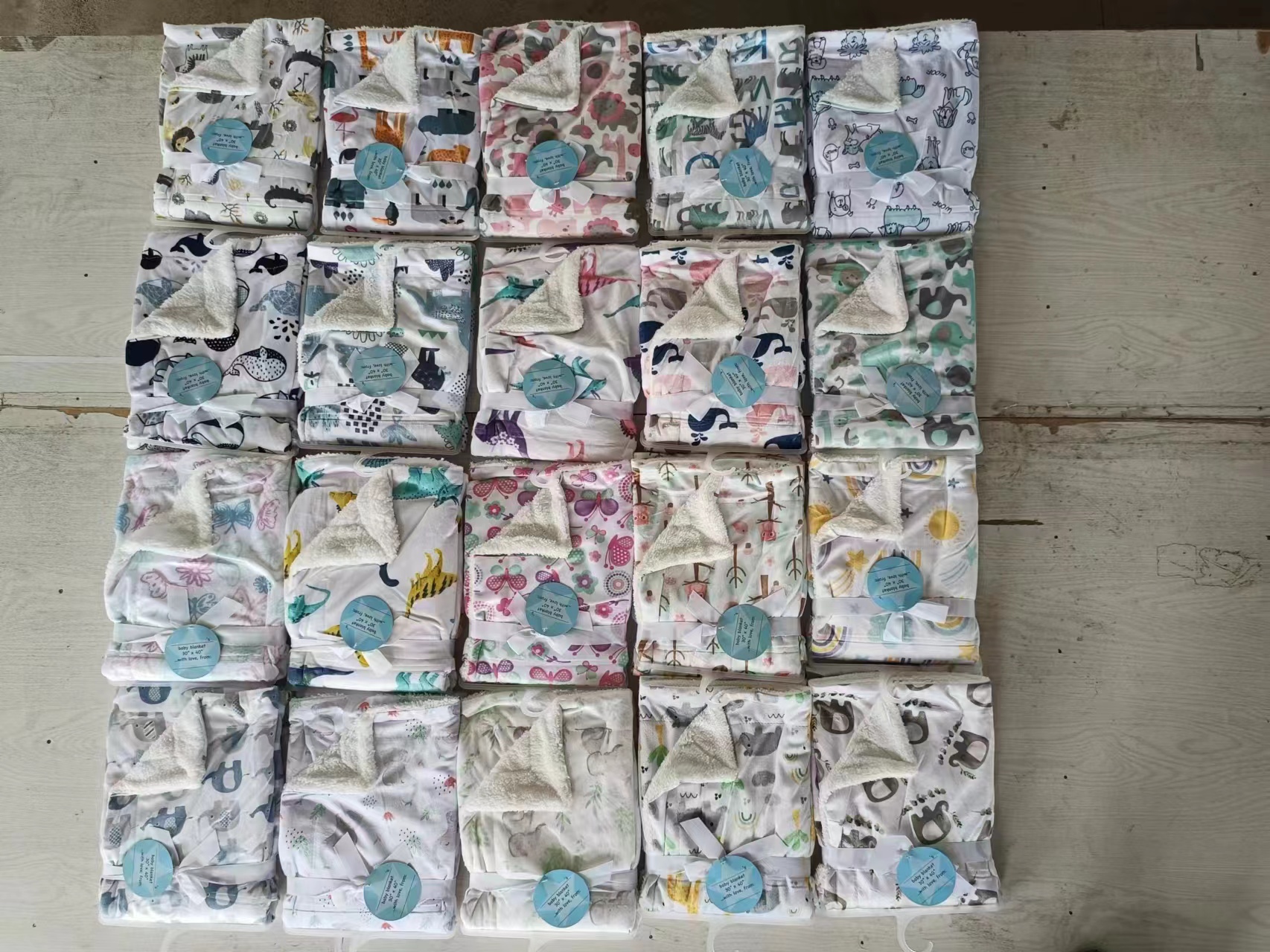 Stock printed mink + sherpa baby blankets