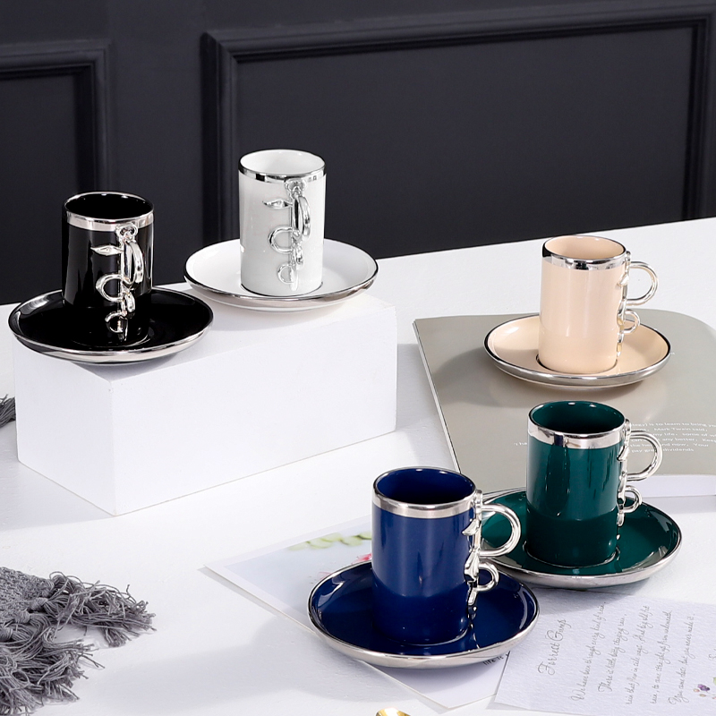 Coffee cup and saucer, cup with metal
