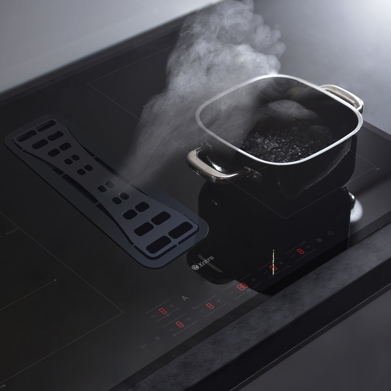 Induction hob with extractor hood