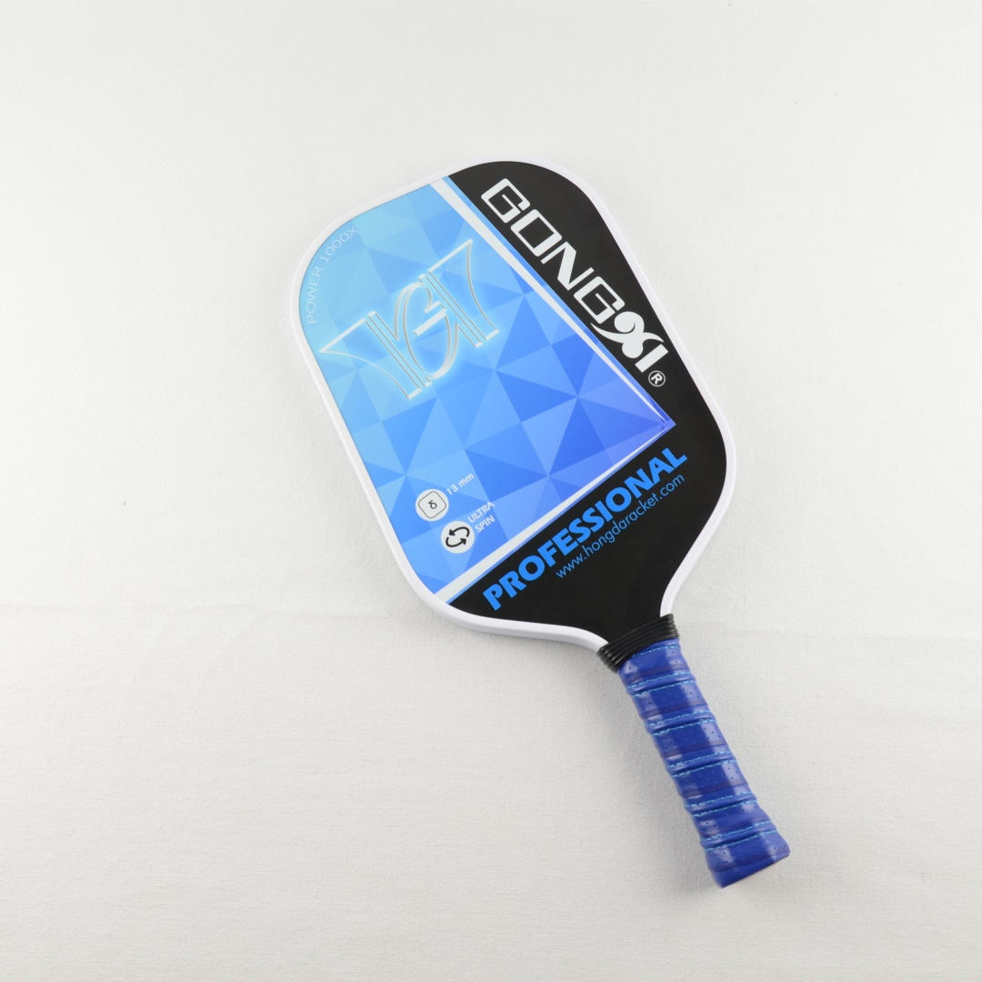 Elongated pickleball paddle