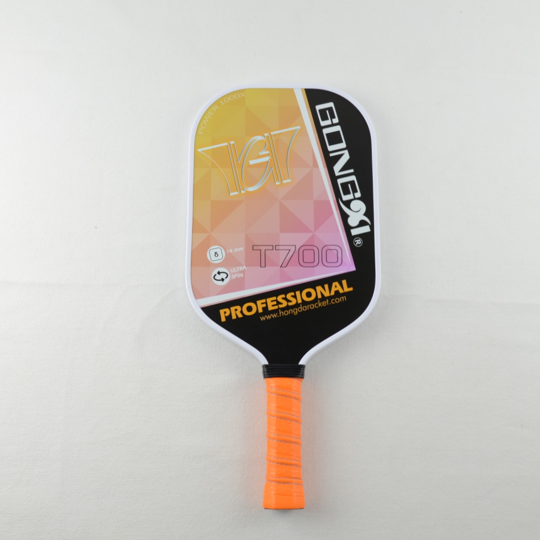 Elongated carbon pickleball paddle