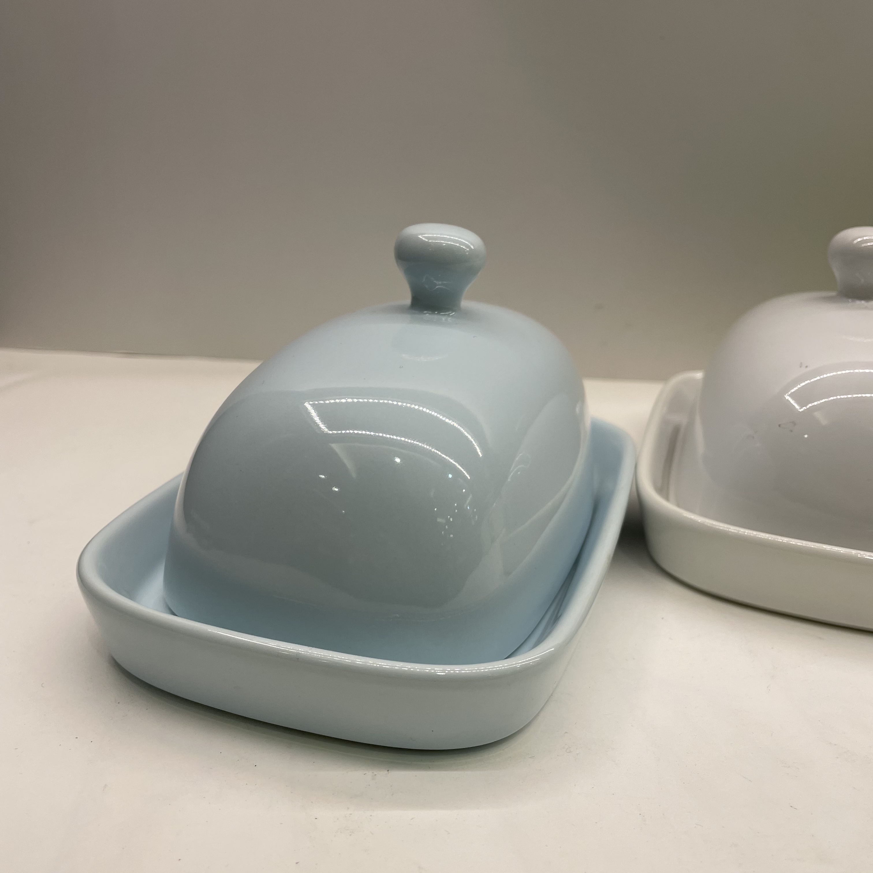 Stoneware covered butter with solid color