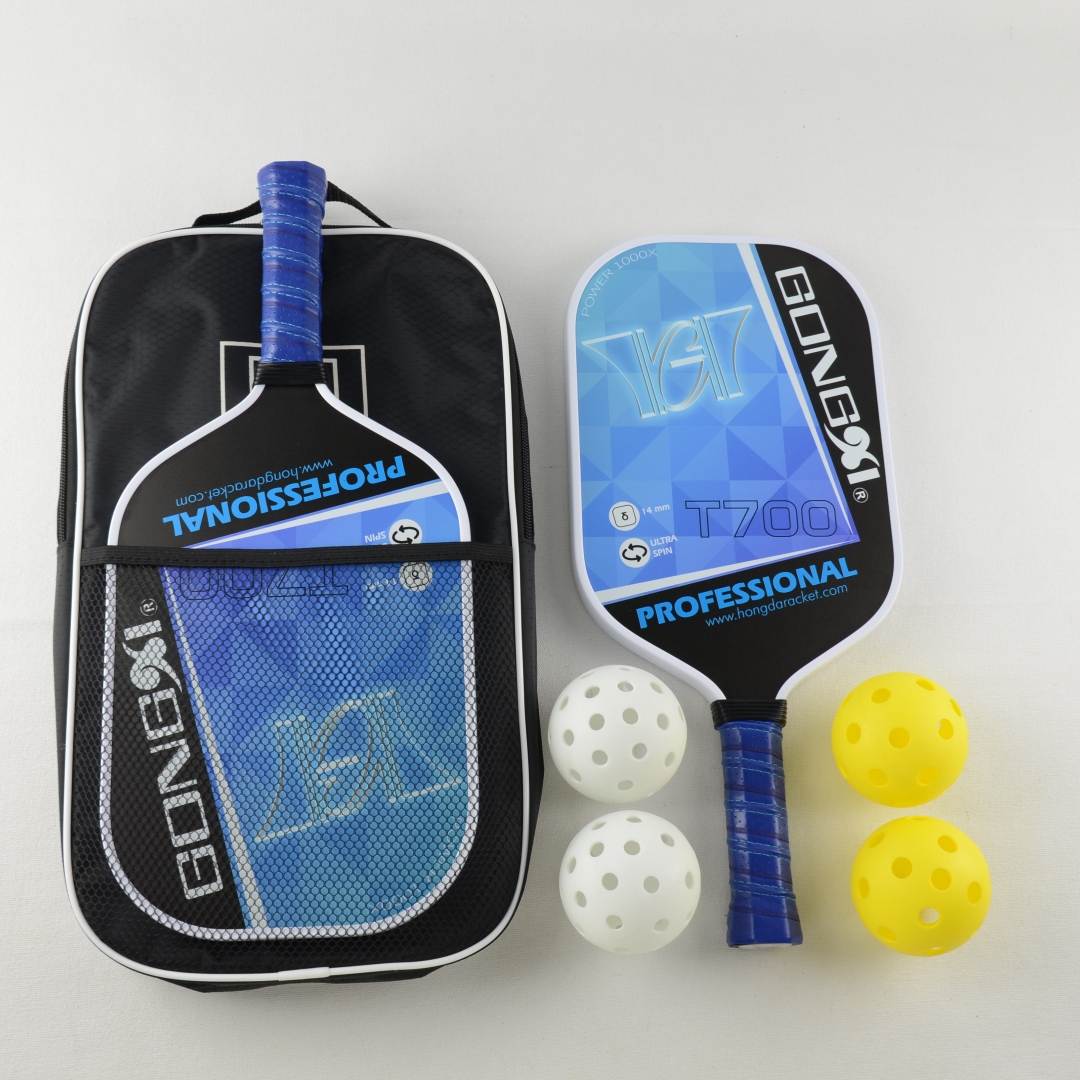Elongated carbon pickleball paddle