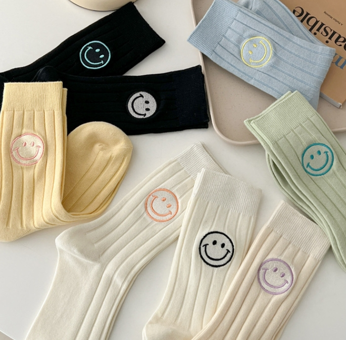 Embroidered smiling face women's socks